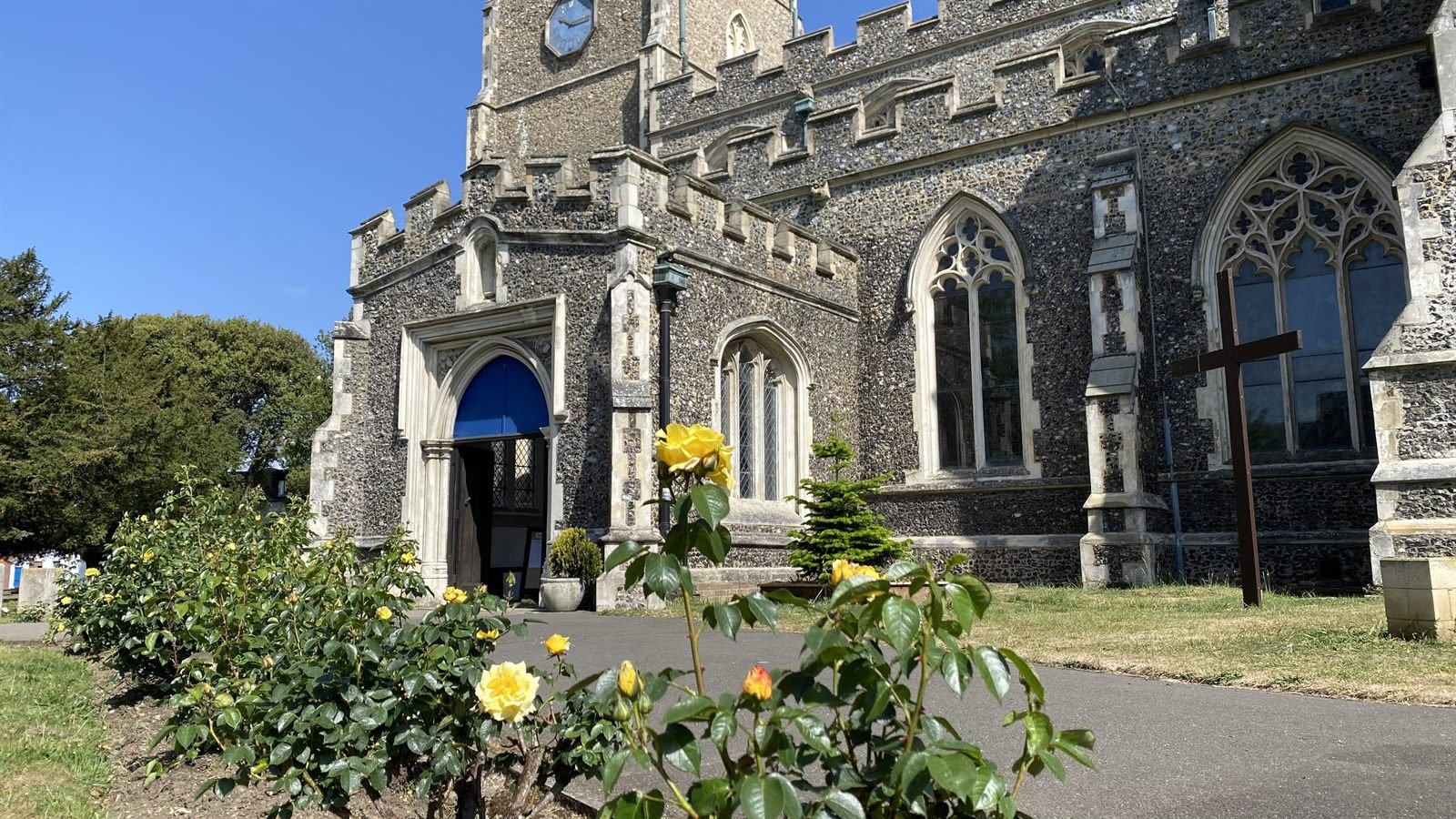 The rose-lined path to the porch of St Mary's, Ware