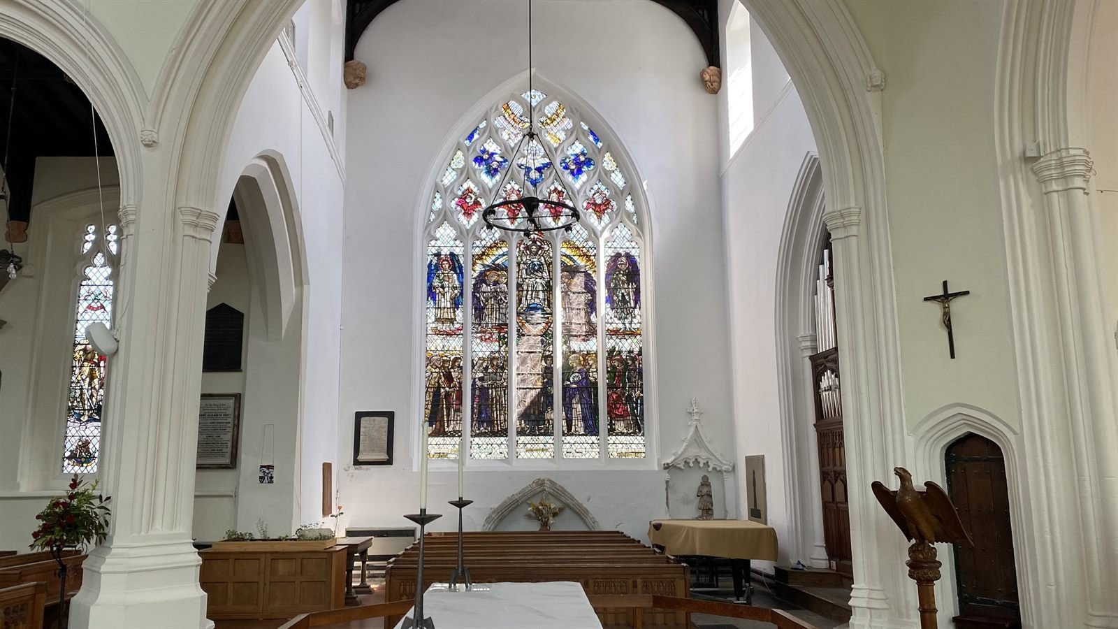 The interior of St Mary's set beneath its stained glass