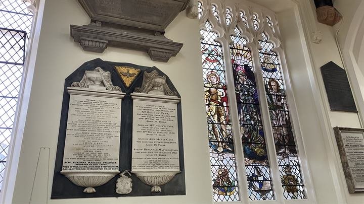 Memorials beneath the windows