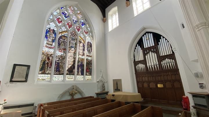 Stained glass and organ pipes