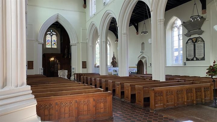 The nave and carved pews