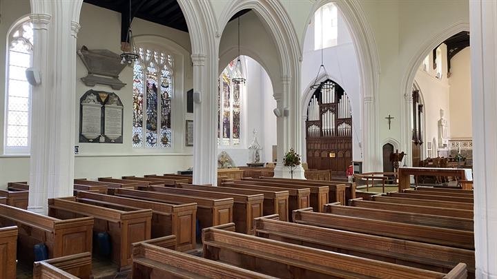 Along the side aisle